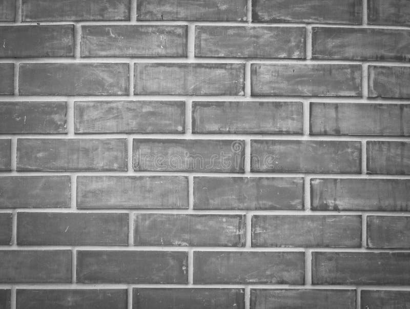 Fundo cinzento da textura da parede de tijolo para o interior e o exterior imagens de stock Fundo cinzento da textura da parede de tijolo para o interior e o exterior imagens de stock