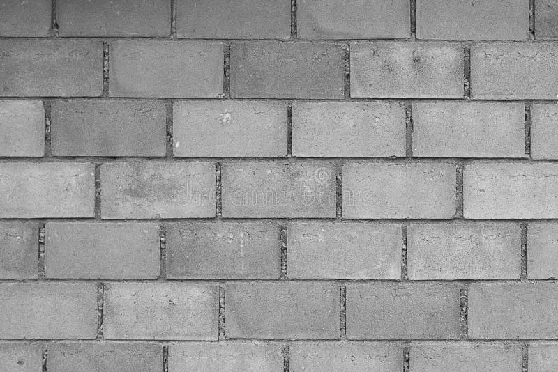 Fundo da parede do bloco de cimento preto e branco imagem de stock Fundo da parede do bloco de cimento preto e branco imagem de stock