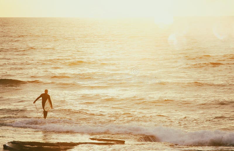 background of the beach, sea and surfer at sunset colors. background of the beach, sea and surfer at sunset colors