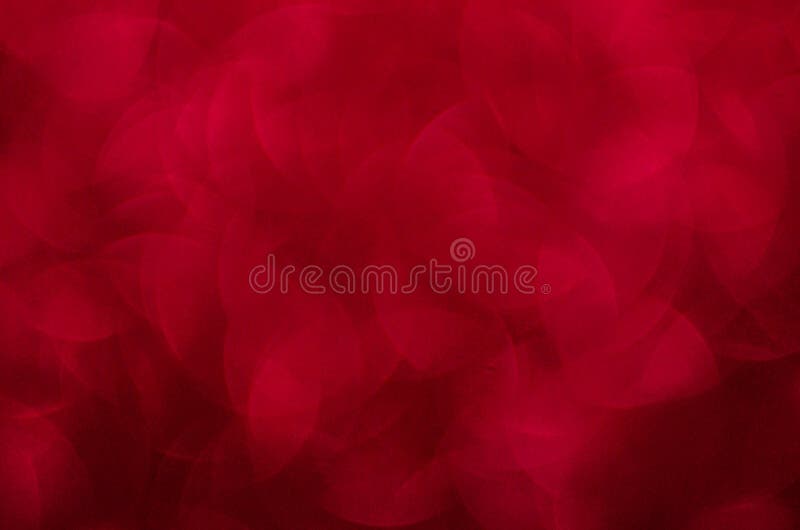 Defocused abstract red glitter background. Sequins on paper. Defocused abstract red glitter background. Sequins on paper