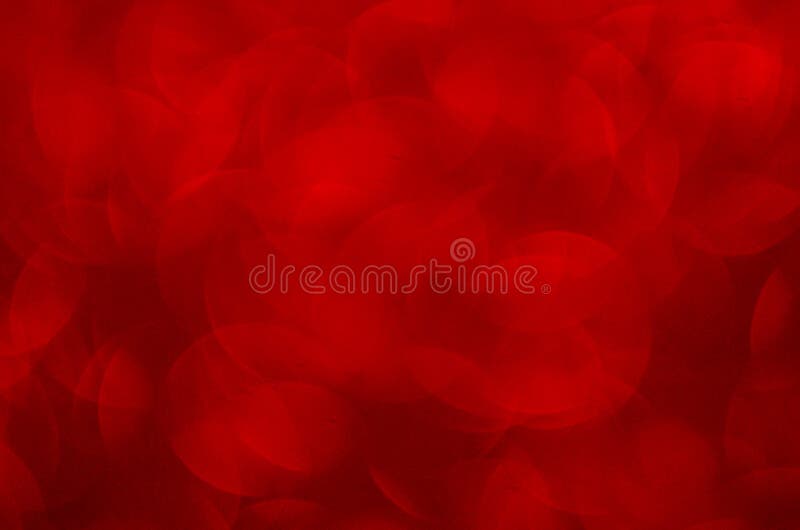 Defocused abstract red glitter background. Sequins on paper. Defocused abstract red glitter background. Sequins on paper