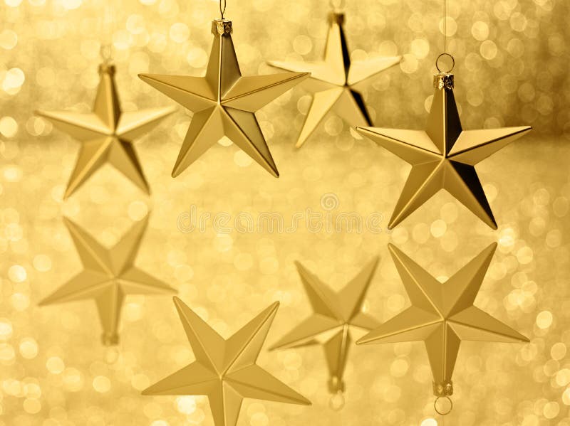 Fundo do brilho de Bokeh das estrelas do ouro imagens de stock royalty free Fundo do brilho de Bokeh das estrelas do ouro imagens de stock royalty free