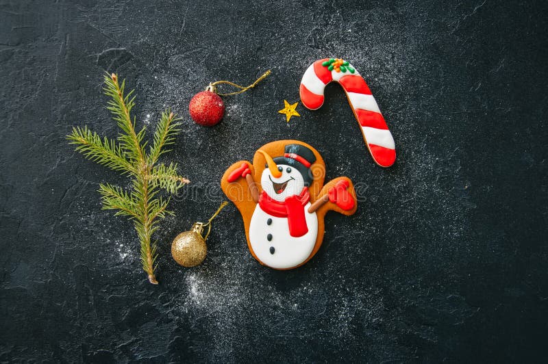 Fundo do Natal Cookies do bastão do boneco de neve e de doces do pão-de-espécie imagem de stock royalty free Fundo do Natal Cookies do bastão do boneco de neve e de doces do pão-de-espécie imagem de stock royalty free
