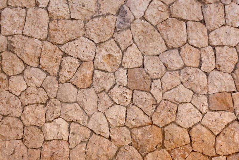 Fundo lascado da parede de pedra foto de stock royalty free Fundo lascado da parede de pedra foto de stock royalty free