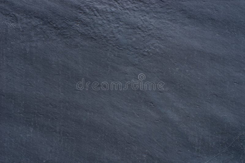 Fundo preto da textura da rocha metamórfica imagens de stock Fundo preto da textura da rocha metamórfica imagens de stock