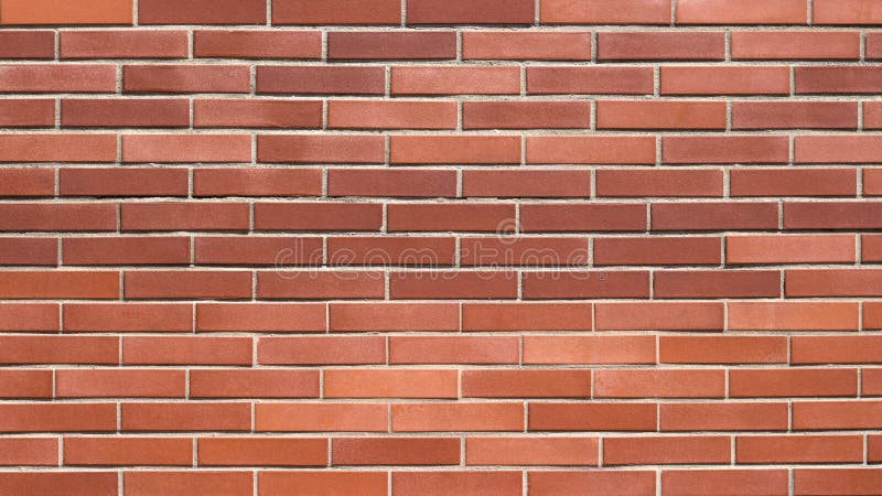 Fundo contínuo de parede de tijolos vermelhos fotografia de stock