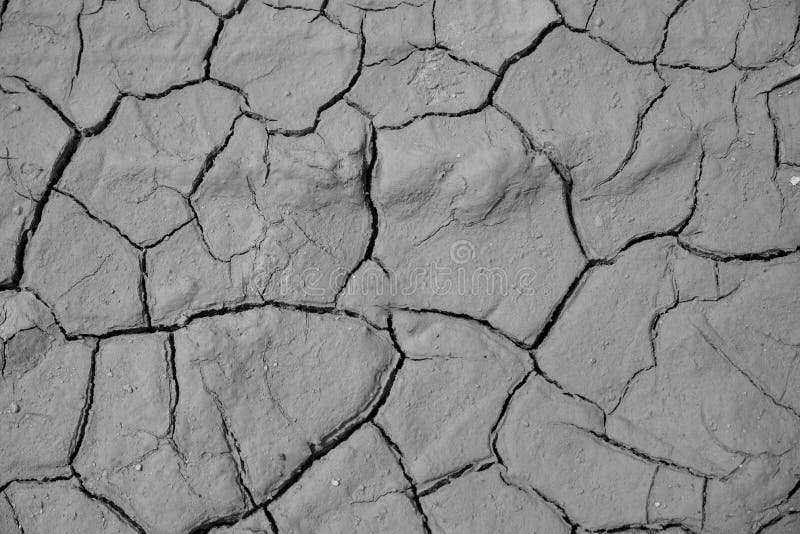Fundo à terra secado da textura do solo rachado da terra imagem de stock royalty free