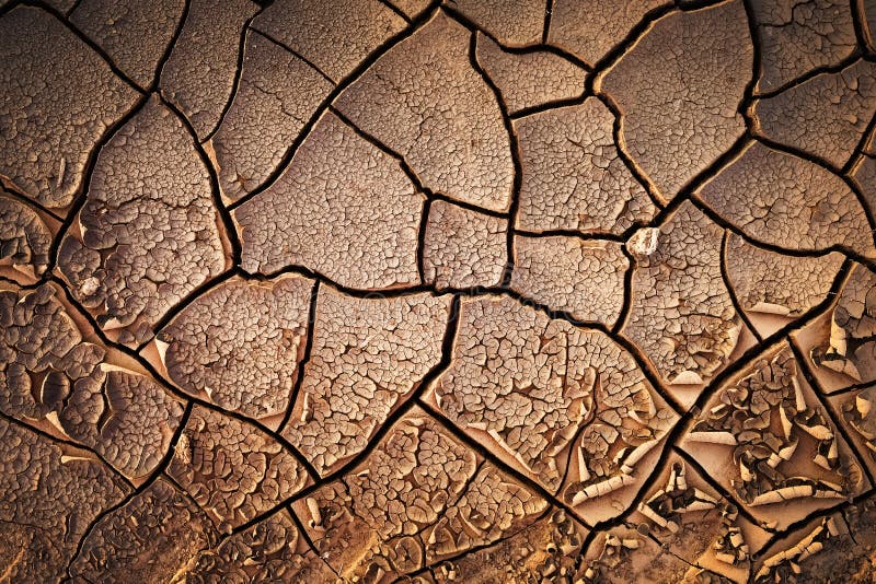 Fundo à terra secado da textura do solo rachado da terra imagens de stock