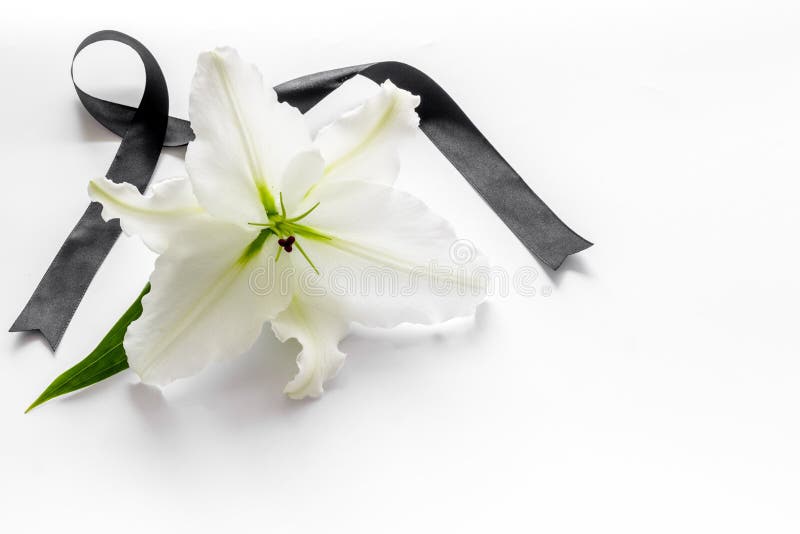 Funeral Lily Flowers With Cross On Dark Stone Background. Mourning ...