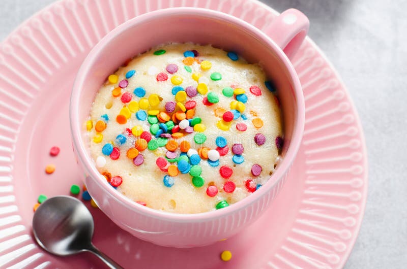 Funfetti Mug Cake, Homemade Cake Cooked in the Microwave Stock Image