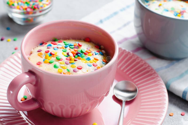 Funfetti Mug Cake, Homemade Cake Cooked in the Microwave Stock Image