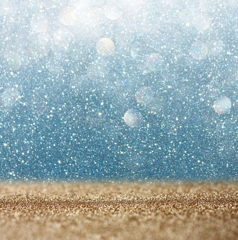 Glitter vintage lights background. light gold and blue. defocused. Glitter vintage lights background. light gold and blue. defocused