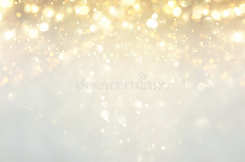 Funkelnweinlese beleuchtet Hintergrund Silber, Gold und Weiß de-fokussiert
