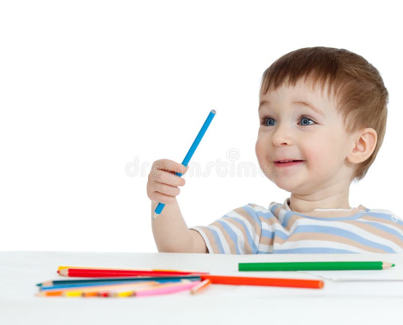 Funny baby boy drawing with color pencils