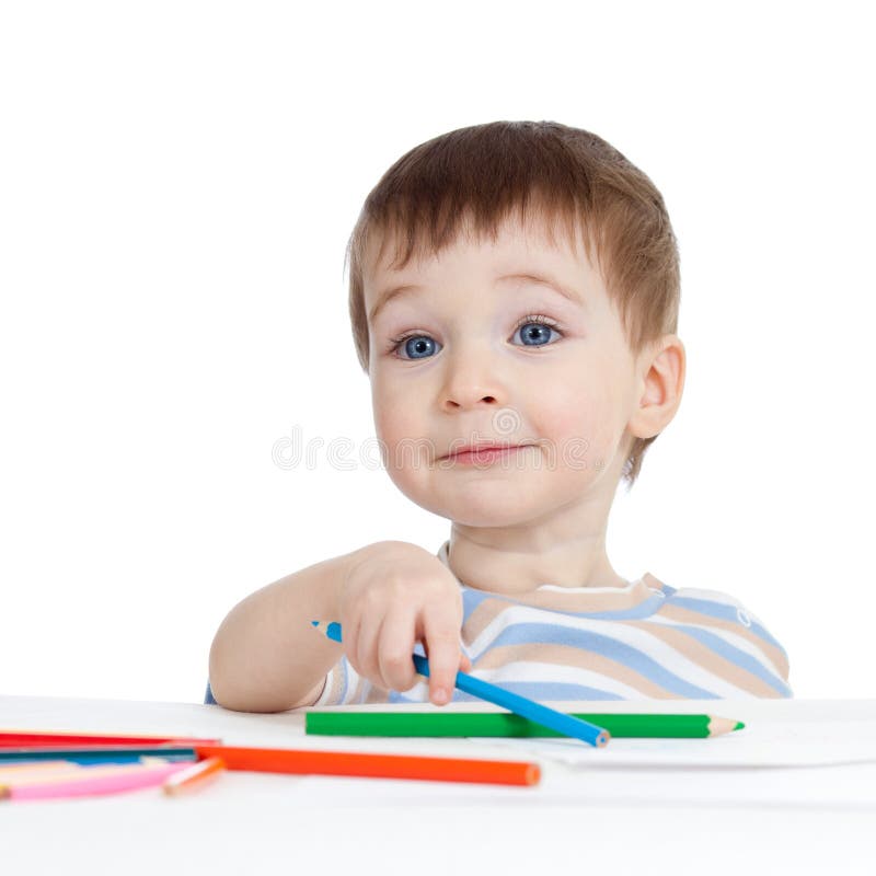 Funny baby boy drawing with color pencils