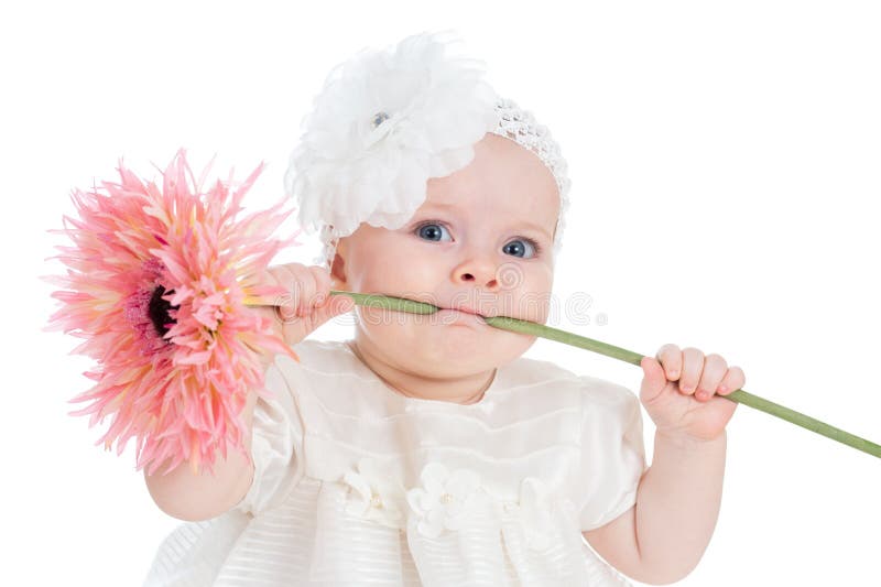 Funny baby girl with flower