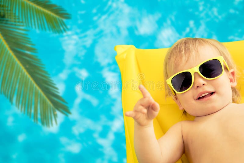 Funny baby on summer vacation