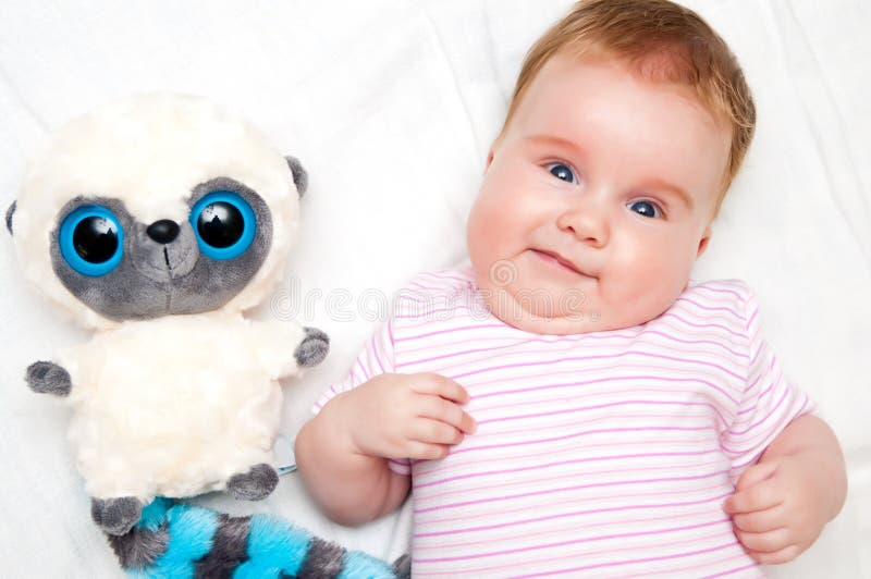Funny baby with toy royalty free stock photos Funny baby with toy royalty free stock photos