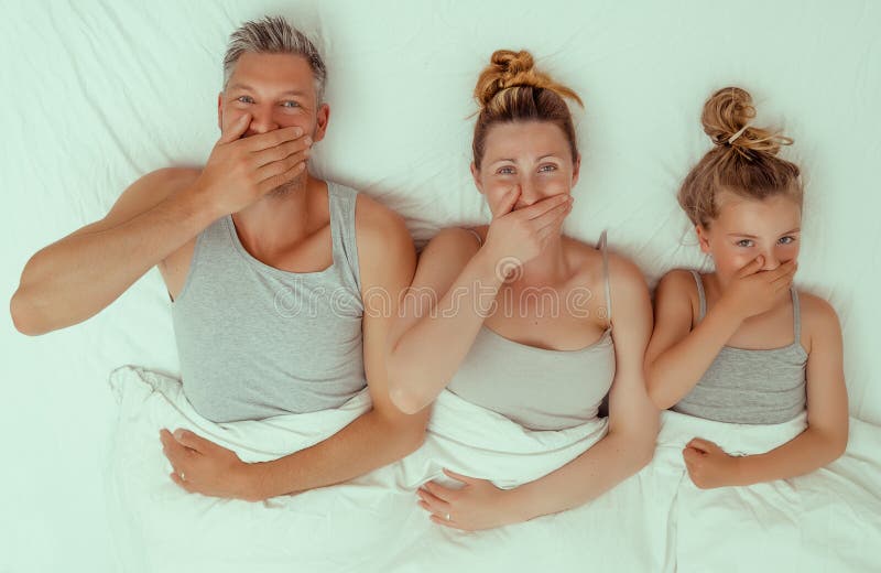 Family bed royalty free stock photos