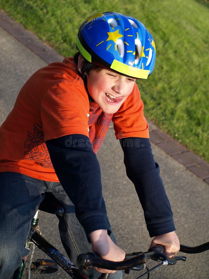 Funny Boy on the Bike with Helmet Stock Image Image of biker, cyclist
