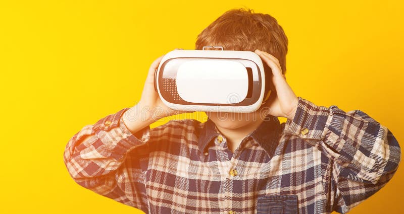 Funny Boy Playing Game in Virtual Reality Glasses. Kid Watching Movies or Playing Video Games, on Yellow. VR Glasses Stock Photo - Image of optical, device: 127697954 Funny Boy Playing Game in Virtual Reality Glasses. Kid Watching Movies or Playing Video Games, on Yellow. VR Glasses Stock Photo - Image of optical, device: 127697954