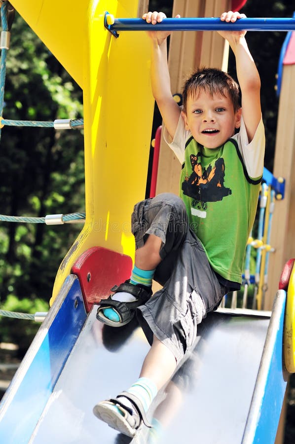 Funny boy on the slide