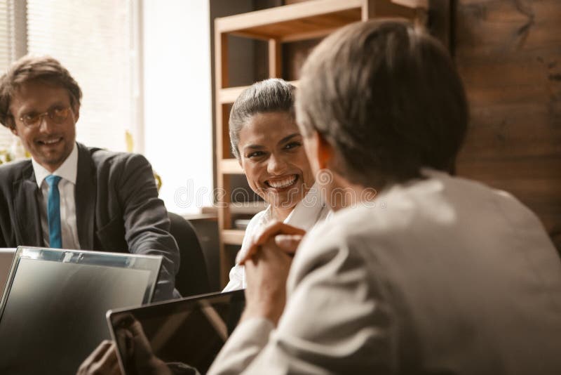 Funny Business People. Happy Office Staff Smiles Each Other during Business  Meeting while Working at Office Table with Stock Photo - Image of  corporation, executive: 198513938