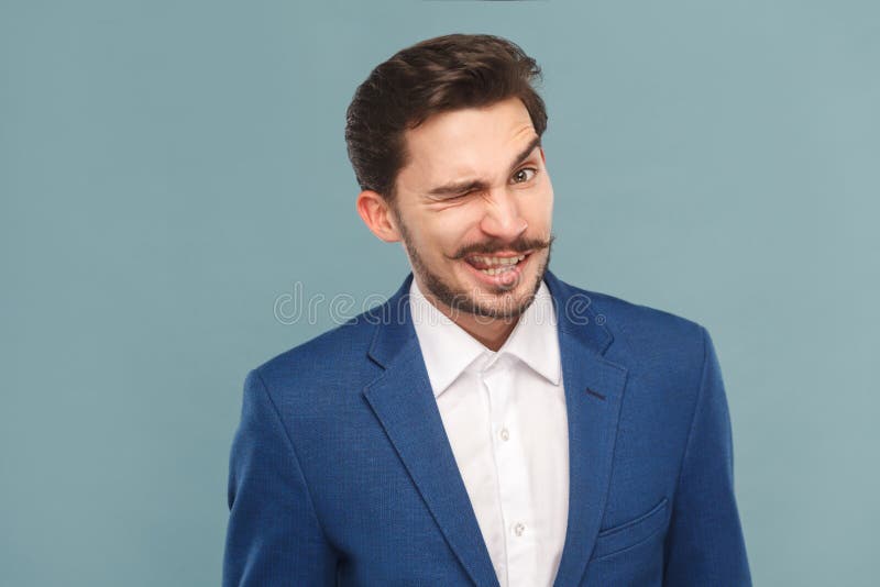 Funny businessman wink and flirt at camera stock photo Funny businessman wink and flirt at camera stock photo