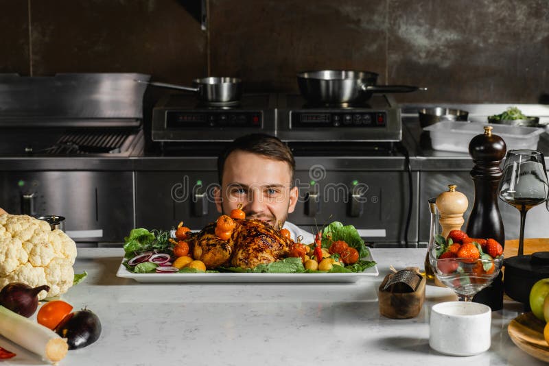 Funny Cooking. Attractive Caucasian Man In The Kitchen Stock Photo, Picture  and Royalty Free Image. Image 65857067.