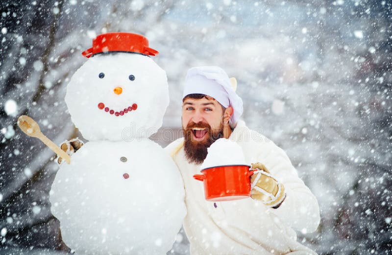 Funny Christmas chef cook. Modern Santa cooking. Joyful Father and snowman - happy winter time. Funny Christmas chef cook. Modern Santa cooking. Joyful Father stock images