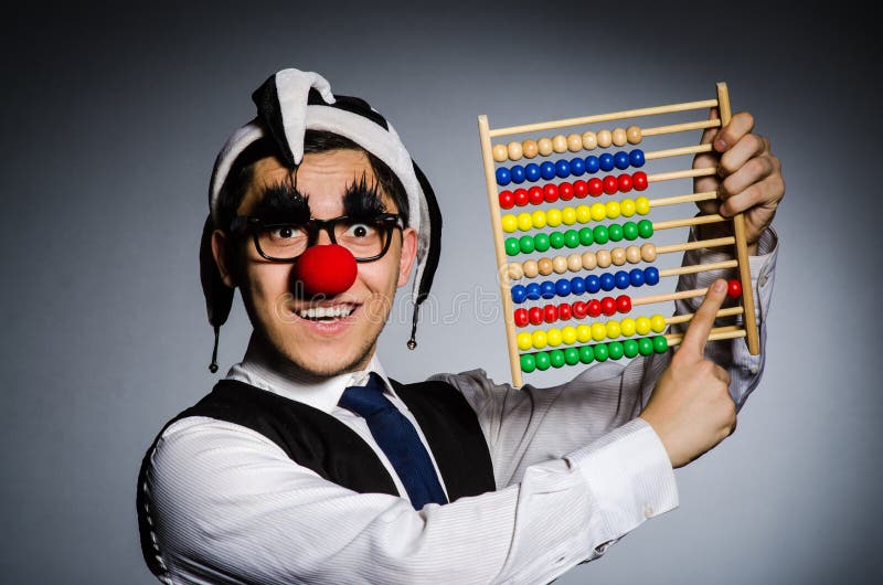 Funny clown with abacus royalty free stock image