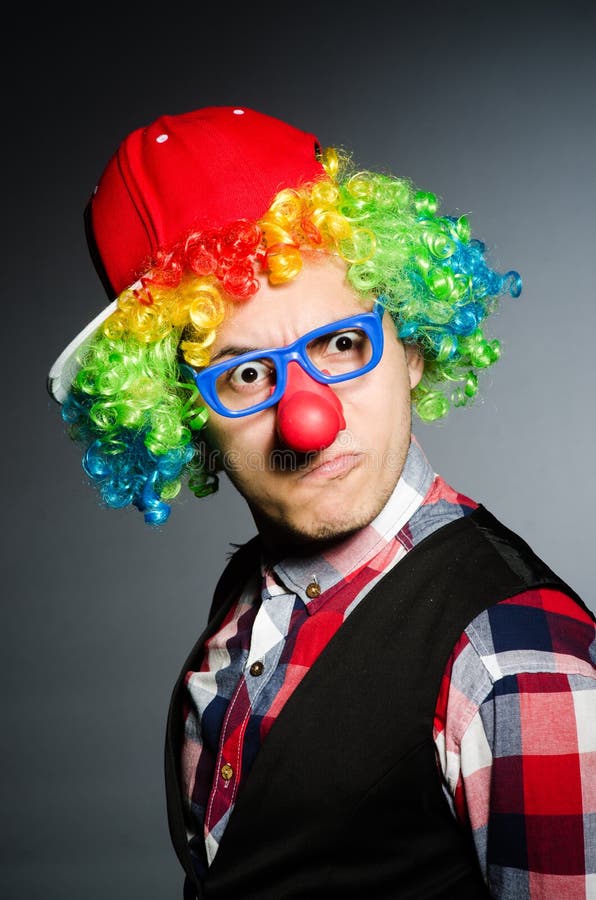 Funny clown against royalty free stock photos