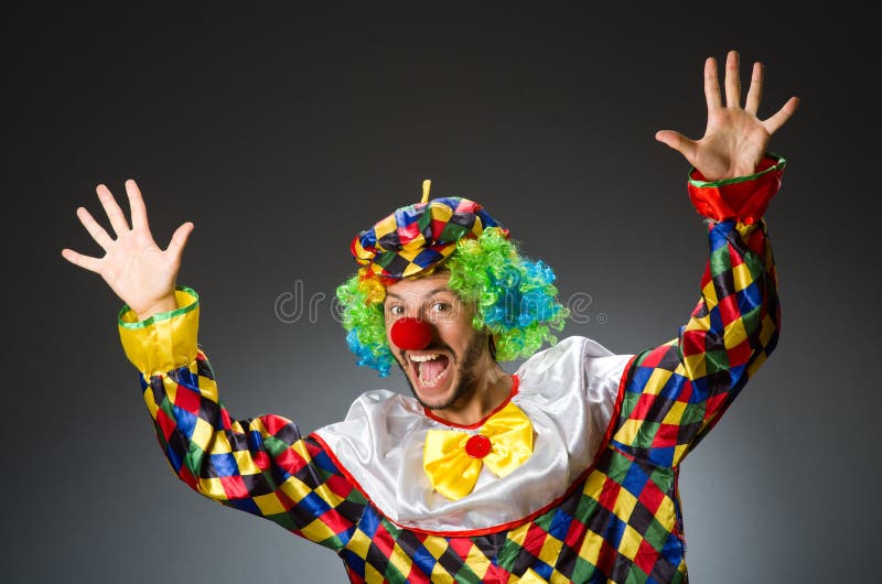 Funny clown in colourful stock image