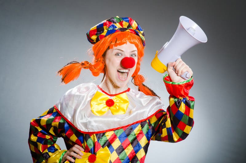 The funny clown in comical concept royalty free stock photo