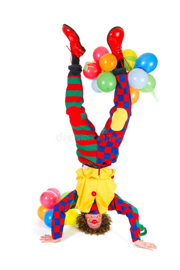 Funny clown in headstand royalty free stock image