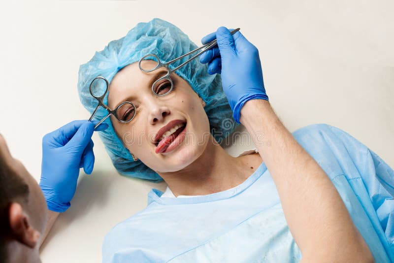 Funny Consultation with Jokes of Plastic Surgeon in Medical Center. Doctor Man in Mask Asks Girl Patient about Stock Photo - Image of needle, medicine: 222055626 Funny Consultation with Jokes of Plastic Surgeon in Medical Center. Doctor Man in Mask Asks Girl Patient about Stock Photo - Image of needle, medicine: 222055626
