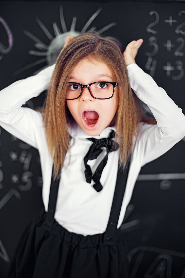 Funny crazy girl student with glasses stock photo