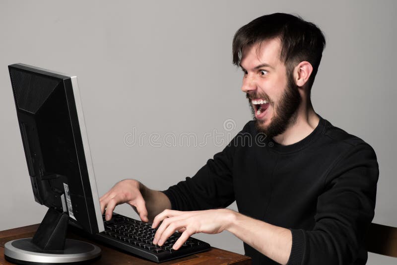 funny-crazy-man-using-computer-gray-back