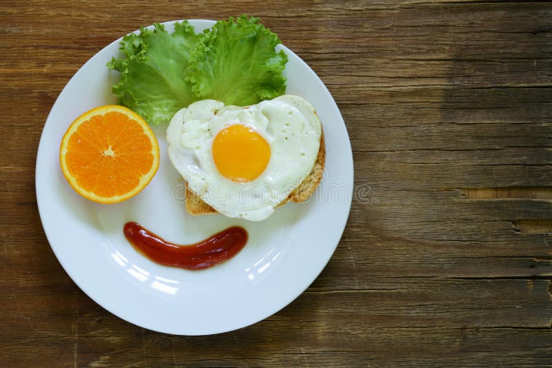 Funny Face Serving Breakfast, Fried Egg, Toast Stock Image - Image of