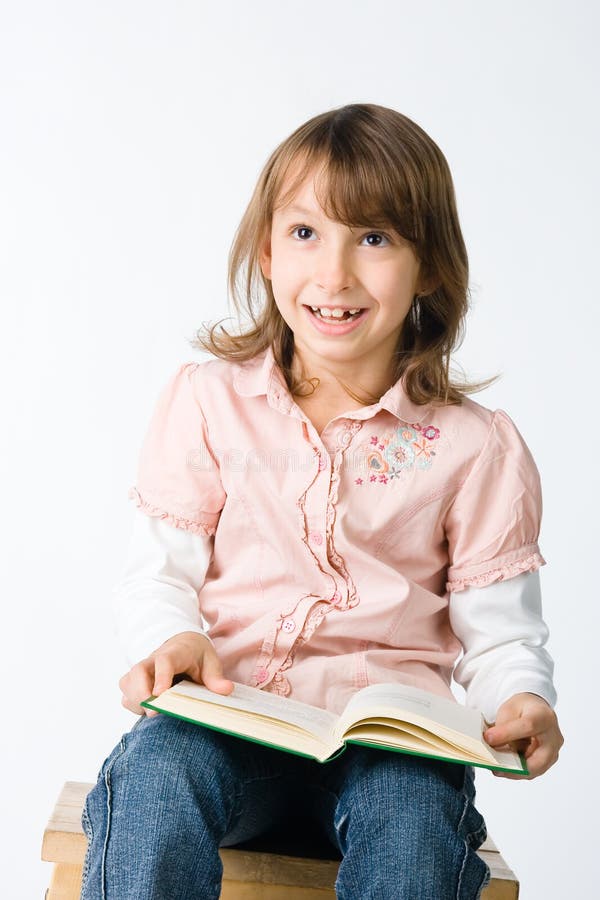 Funny girl with a book stock image. Image of female, child 14687947
