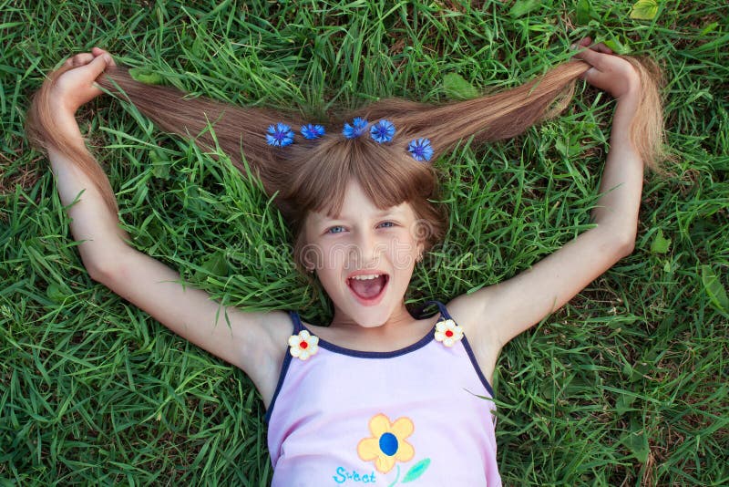 Funny Girl Lying Grass Pulling Her Hair Stock Photos - Free & Royalty ...