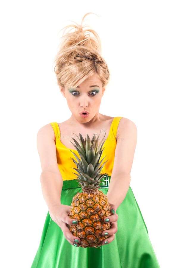 Funny girl with pineapple isolated on white