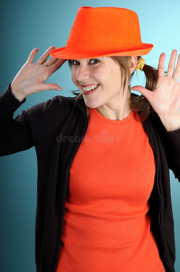 Funny girl showing orange accessories