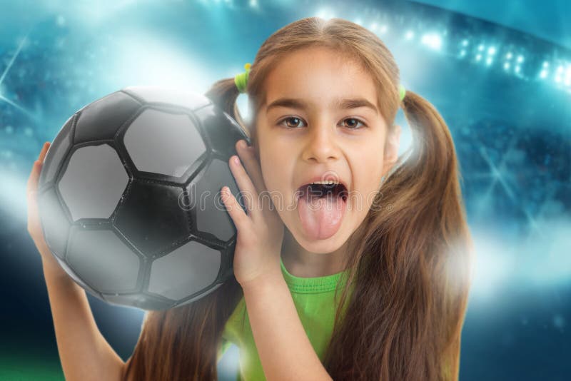  Funny  Girl  With A Soccer  Ball Shows Tonque Stock Photo 