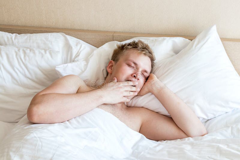 Funny Guy in Bed Under the Blanket after Sleeping. Sleepy Man Waking Up  Stock Photo - Image of napping, blanket: 147225846