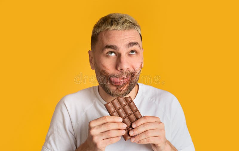 Funny Guy Eats Chocolate and Rolls His Eyes Stock Image Image of