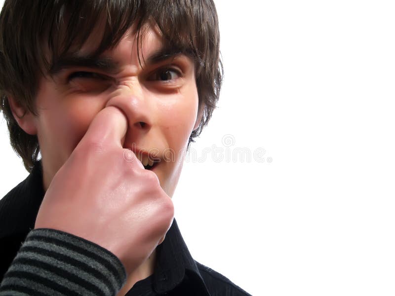 A portrait about a trendy handsome young man who is smiling and he is pointing his index finger to his nose hole. He is wearing a stylish black shirt. A portrait about a trendy handsome young man who is smiling and he is pointing his index finger to his nose hole. He is wearing a stylish black shirt.