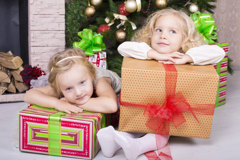 Funny kids with Christmas gift