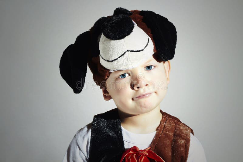 Funny little Boy in Carnival Costume.Dog.Masquerade.Child.Halloween