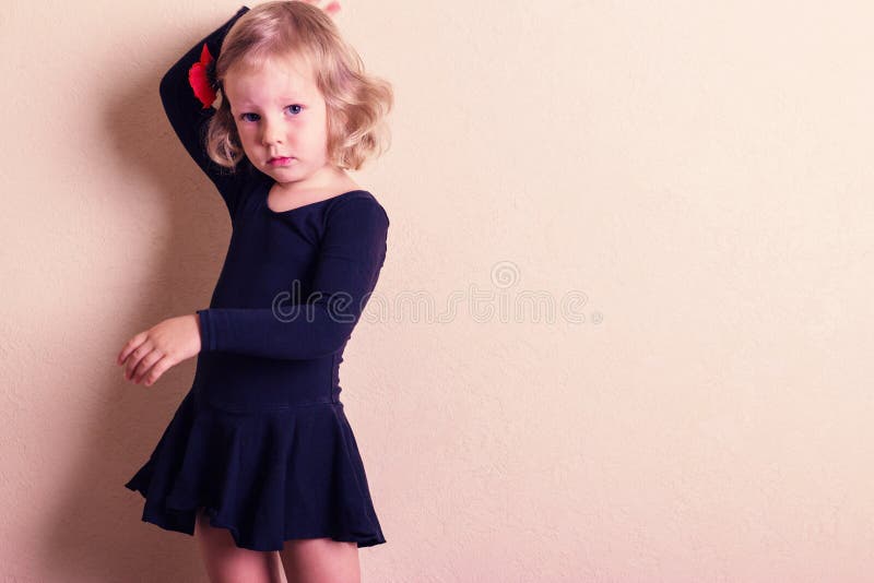 Funny little girl dancing. stock image. Image of female 58059549